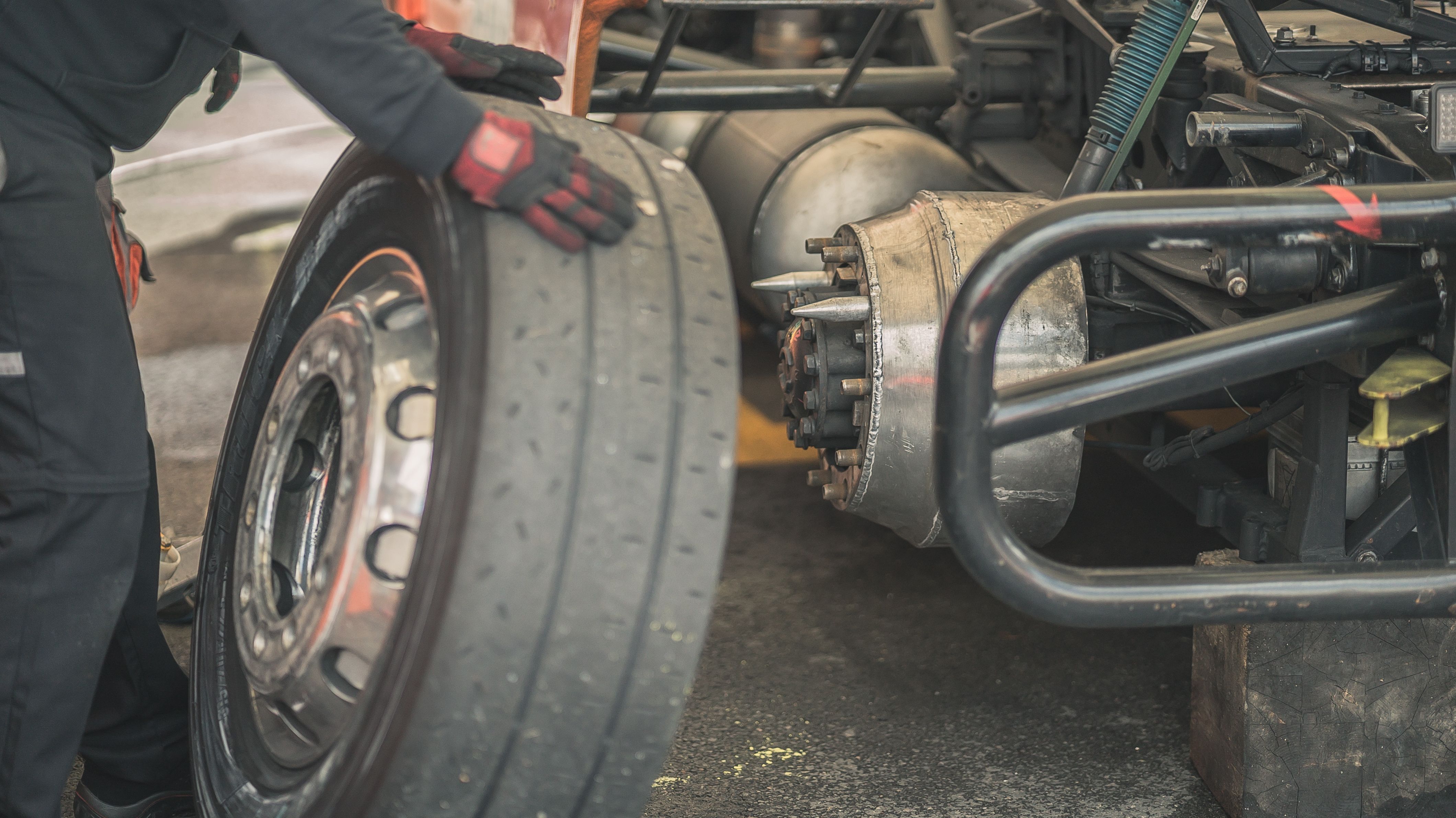 Tire mounting and balancing equipment